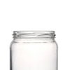 Venta caliente Jarra de vidrio personalizado Bebida para el envasado de alimentos de cristalería con mermelada de miel con tapas rojas de plástico