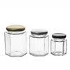 Botella de pepinillo de vidrio de almacenamiento de alimentos personalizados al por mayor 45ml/60ml/85ml/100ml/180ml/280ml/380ml/500ml/730ml Jares de vidrio para miel