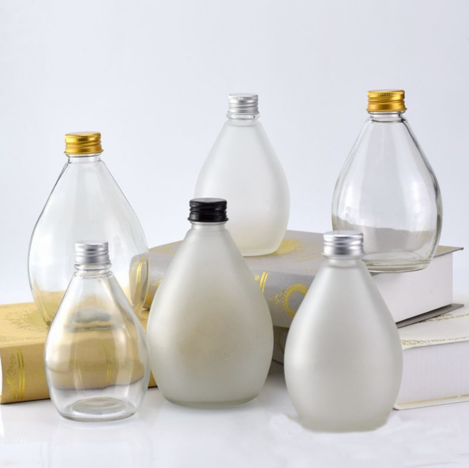 Gotas de agua Diseño de jugo de jugo Botellas de vidrio KDG Fábrica