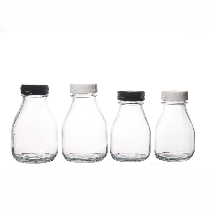 Vidrio vacío de 350 ml de botellas de leche botellas Venta calientes con tapas de plástico