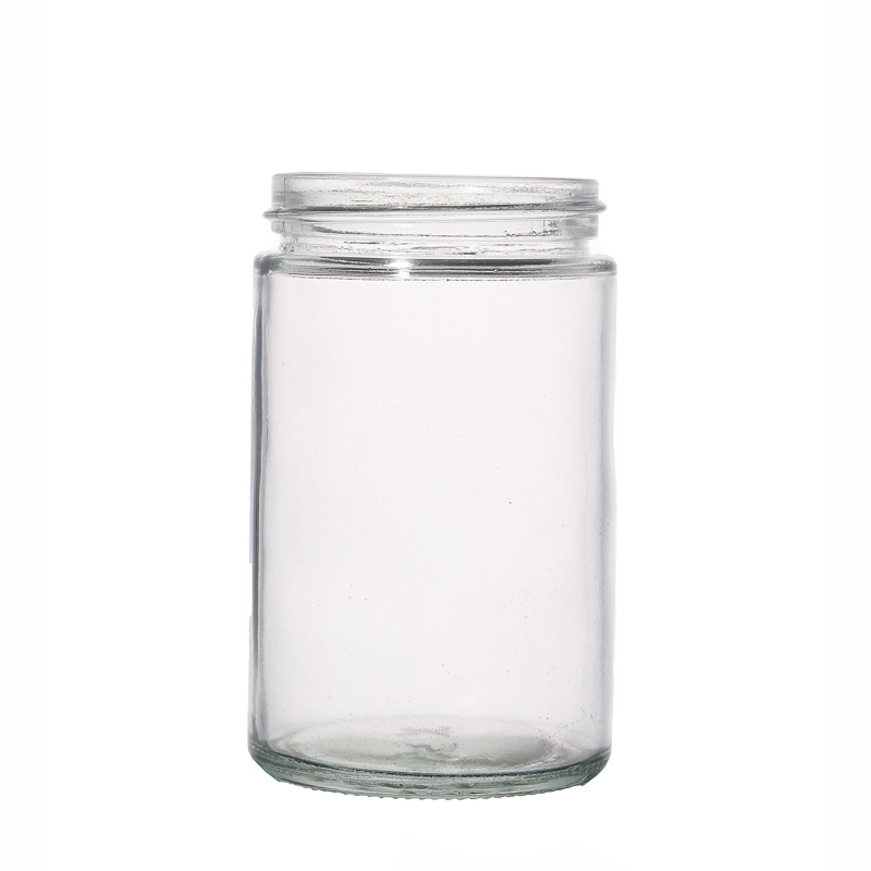 Frascos de vidrio con tapas de madera