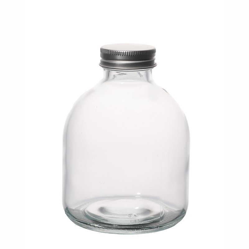 Botellas de vidrio en forma redonda con tapas de tornillo Venta en caliente